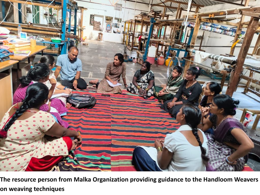 The resource person from Malka Organization providing guidance to the Handloom Weavers on weaving techniques